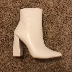 White heeled boots
